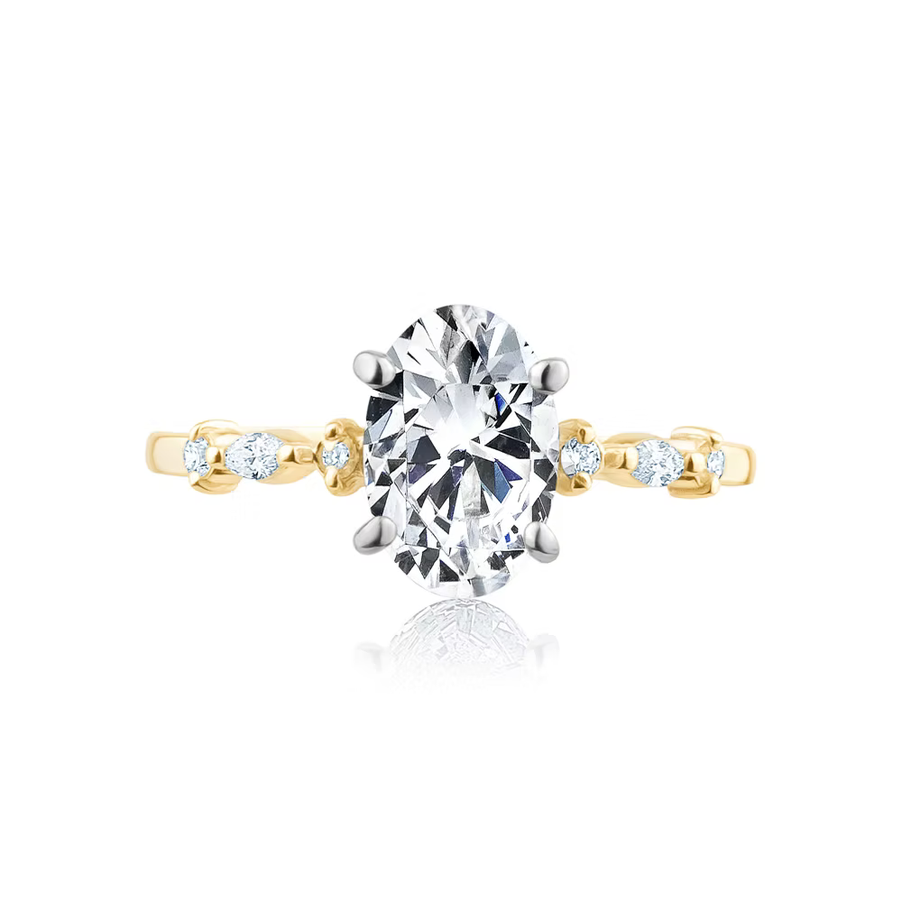 L’Orée Oval Cut Engagement Ring With Side Stones