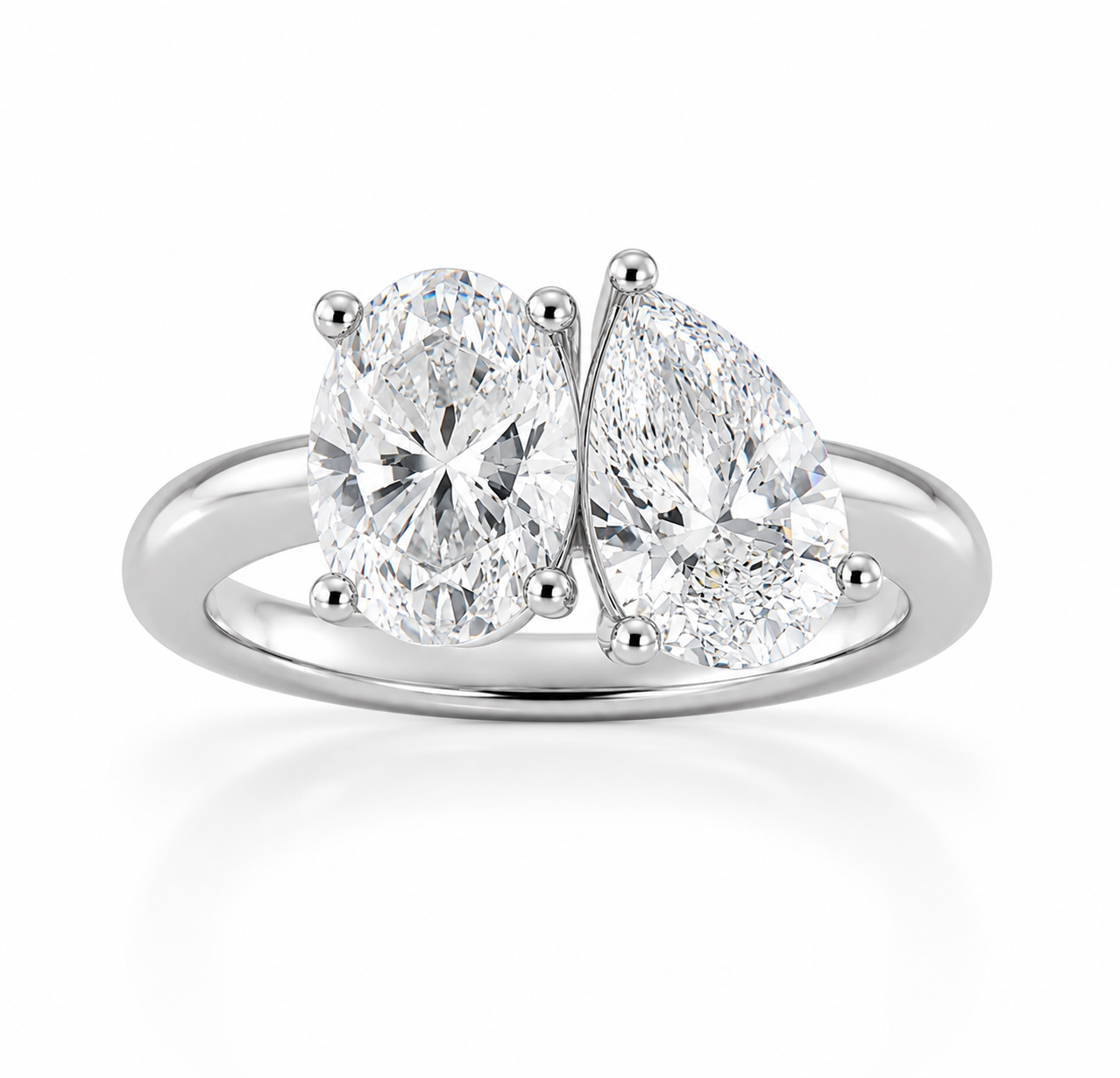 L’Orée Two Carat Toi et Moi Pear and Oval Cut Engagement Ring