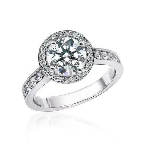 L’Orée Round Cut Engagement Ring With Halo And Channel Set Band