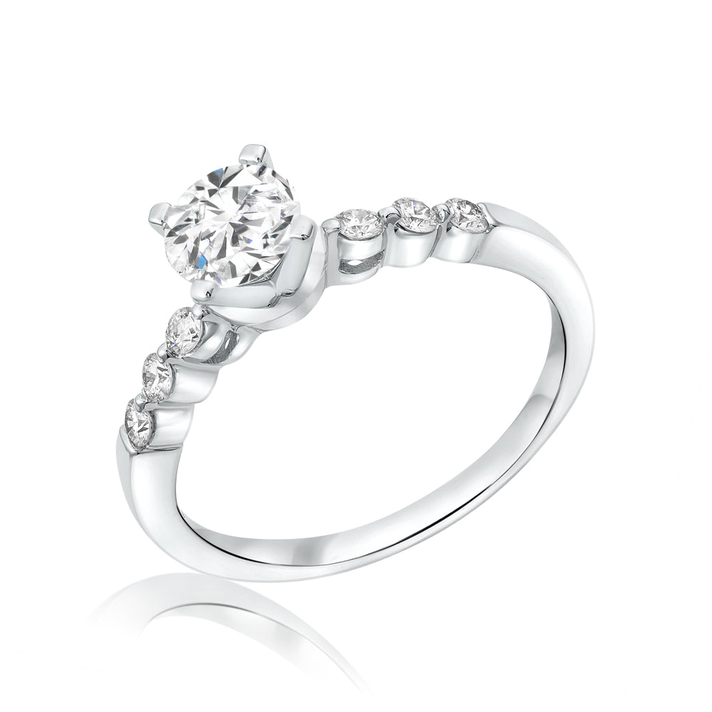 L’Orée Round Cut Solitaire Engagement Ring With Side Stones